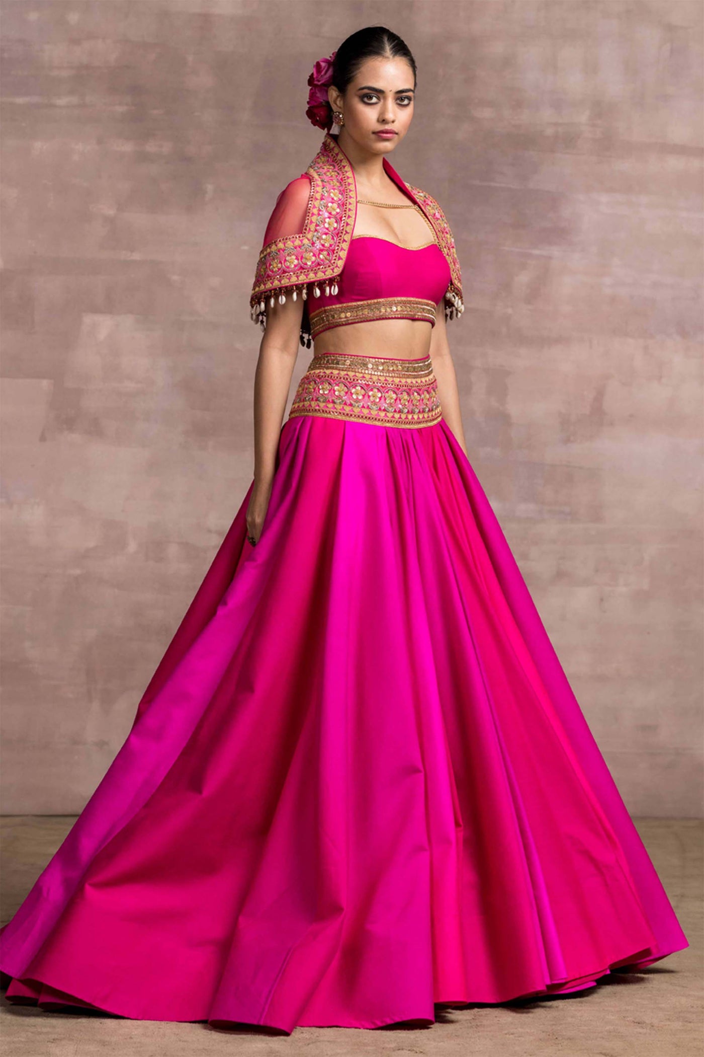 Tarun Tahiliani Tussar Draped Lehenga With Embroidered Hip Yoke And Bustier With Embroidered Sheer Cape fuchsia pink festive indian designer wear online shopping melange singapore