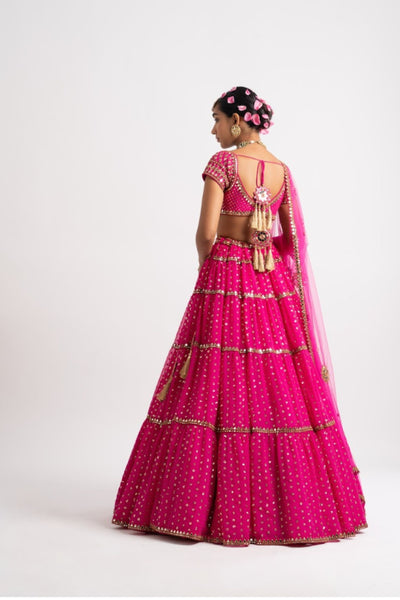 V Vani Vats Fuschia Multi Tier Lehenga Set indian designer wear online shopping melange singapore