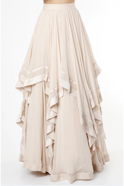 maison blu Ivory Ruffle Skirt With Bustier And Pink Embellished Long Tassels Cape festive fusion Indian designer wear online shopping melange singapore