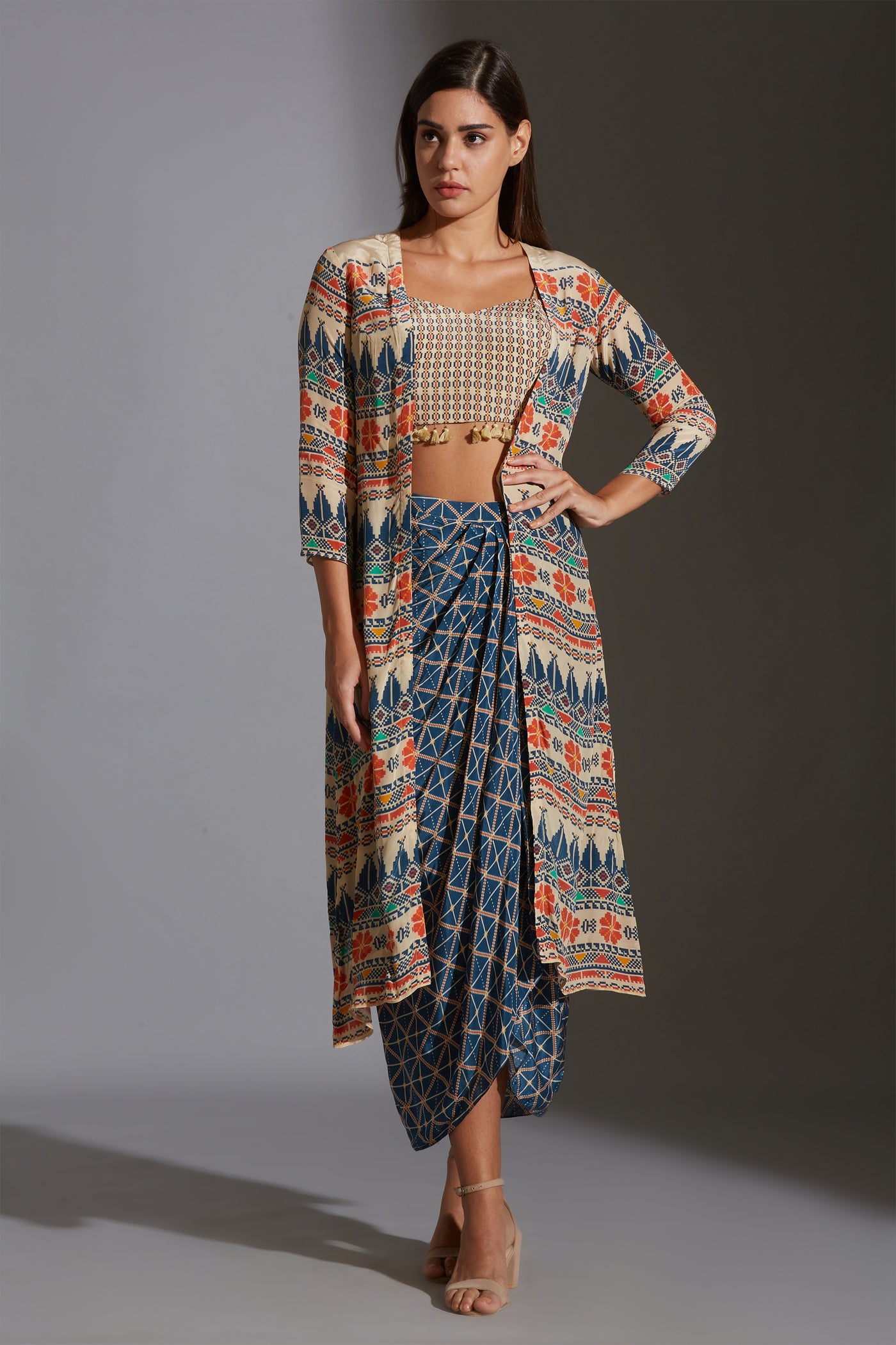 sougat paul Printed bustier with tassel detail paired with dhoti drape skirt and jacket multicolor festive fusion online shopping melange singapore indian designer wear