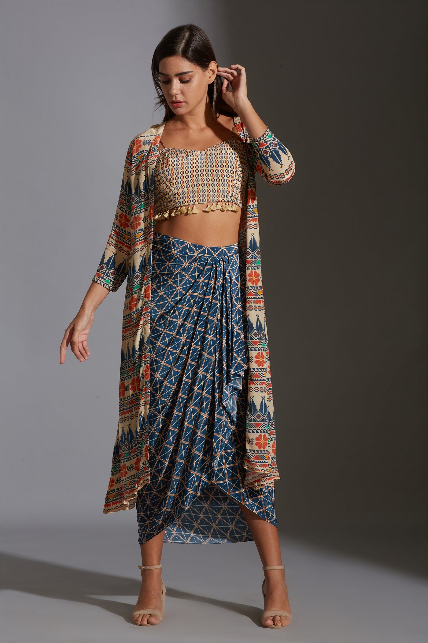 sougat paul Printed bustier with tassel detail paired with dhoti drape skirt and jacket multicolor festive fusion online shopping melange singapore indian designer wear