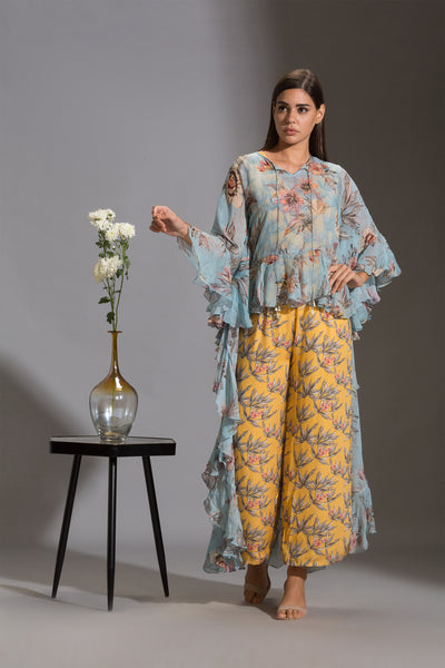 sougat paul Printed jumpsuit paired with printed asymmetrical top with frills yellow blue fusion online shopping melange singapore indian designer wear